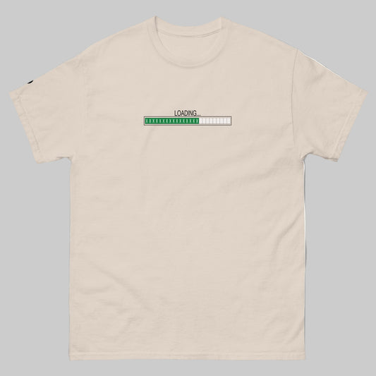 TrapCrackshots Loading Natural T-shirt for clay shooters chasing 25/25. Premium cotton tee symbolizing mastery, progress, and passion for trap shooting.